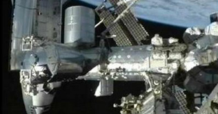 Space shuttle undocks from space station